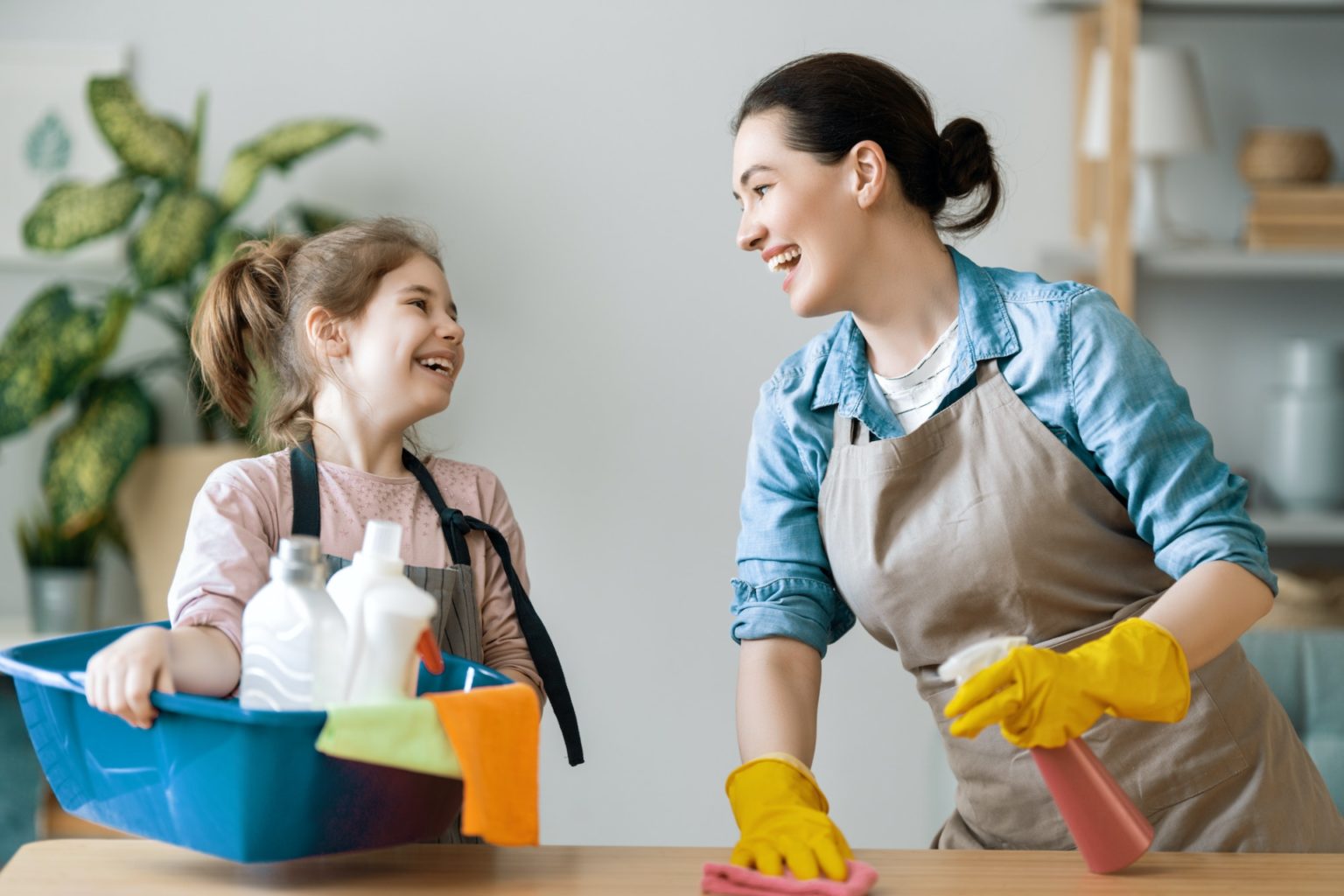 family cleaning the room